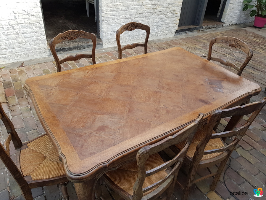 Wooden dining table with 6 chairs