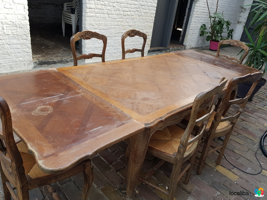 Wooden dining table with 6 chairs